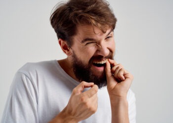 Vientisas ir natūralus lietuviškas pavadinimas galėtų būti:**Klibantis dantis: priežastys ir ką daryti**