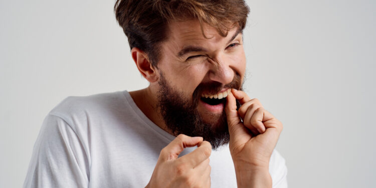 Vientisas ir natūralus lietuviškas pavadinimas galėtų būti:**Klibantis dantis: priežastys ir ką daryti**