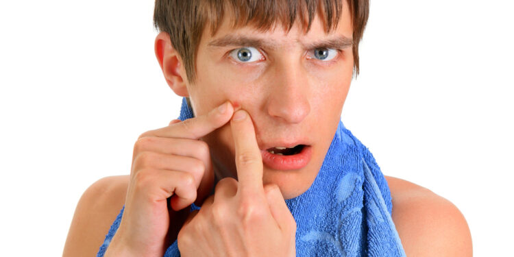 Kodėl mano gerklėje atsirado spuogas?