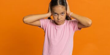 Kaip sustabdyti ir išvengti spengimo ausyse po koncerto