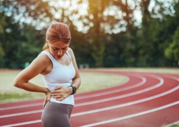 Nugaros skausmas po bėgimo: priežastys ir gydymas