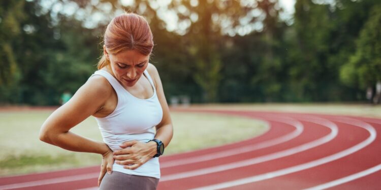 Nugaros skausmas po bėgimo: priežastys ir gydymas